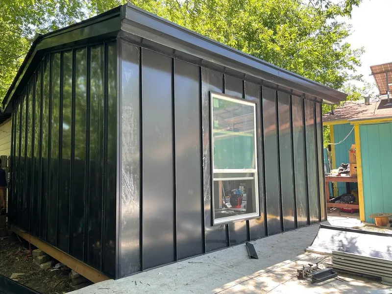 Black standing seam metal wall panels for Metal Roof Installation in Hutto