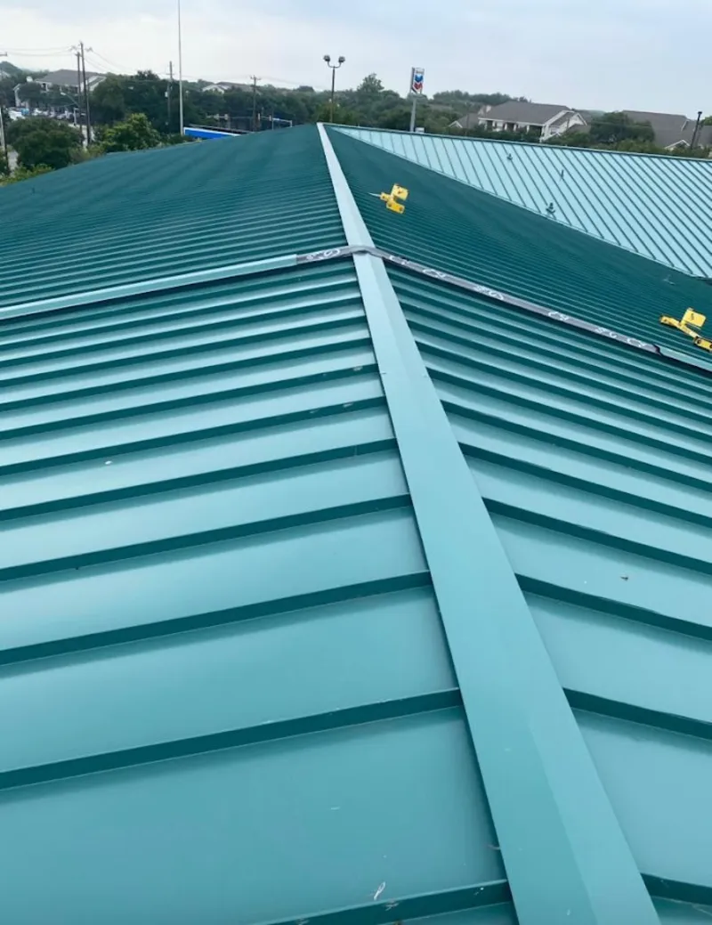 Green commercial metal roof ridge and valley for Metal Roof Repair in Hutto